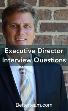 a man wearing a suit and tie standing in front of a brick wall with the words executive director interview questions