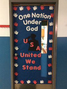 a door with the words one nation under god painted on it