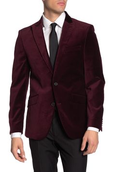 Up your style game with this jewel tone, velvet blazer. Fit: this style fits true to size. S=short, R=regular, L=long. Velvet construction. Slim cut. Peak lapel. Long sleeves with four cuff functional buttons. Two button closure. 3 outer pockets. 4 inner pockets. Side vents. Lined. Approx. 29" length (size 40R). Imported Burgundy Velvet Blazer Mens, Tailored Velvet Suit With Lapel Collar, Velvet Single-breasted Blazer With Suit Collar, Party Blazer With Notch Lapel And Pockets, Winter Velvet Outerwear With Suit Collar, Velvet Suit Collar Outerwear For Winter, Velvet Notch Lapel Blazer With Single Button, Velvet Outerwear With Suit Collar For Winter, Winter Formal Solid Color Blazer