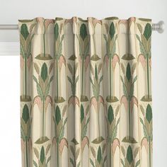 a curtain with an art deco design on it's side and green leaves in the middle