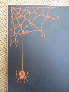 an image of a spider web on a card