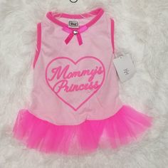 a pink dress with the words mommy's princess written on it and a heart