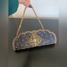 Never Used Ethnic Clutch/Purse In Navy Blue With Gold Embellishments. Bohemian Embellished Clutch Gift, Bohemian Embellished Clutch As Gift, Bohemian Embellished Clutch For Gift, Blue Beaded Clutch For Gift, Blue Bohemian Bag For Evening, Blue Bohemian Evening Bag, Blue Embroidered Clutch As Gift, Blue Bohemian Clutch Gift, Blue Bohemian Clutch As A Gift