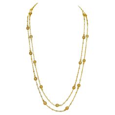 Circa 1890s, 18k, France. This 62-inch-long antique French necklace features elegant handmade filigree elements. Stylishly versatile, it can be worn long, wrapped once, or layered with pearls and/or other chains. The look is brilliantly town and country. Excellent condition. Remark: "As perfectly chic today as it was fashionable over a hundred years ago, and soooo French!" SIZE: 62 inches long WEIGHT: 48.6 grams STONES: none HALLMARKS: French eagle's head for 18k, rhinoceros head, maker's mark, French Necklace, Eagle Head, Maker's Mark, Town And Country, Link Necklace, Makers Mark, French Antiques, Chain Necklace, Jewelry Necklaces