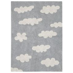 a gray rug with white clouds on it