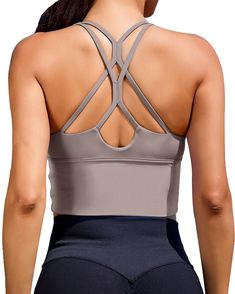 PRICES MAY VARY. Sports bras down to a science. This crop tops sports bra Just take it from this medium-support style. workout crop top designed with a breathable strappy design in back, adjustable stretch straps workout bras for women,athletic crop tops for women moisture-wicking fabric and an all-way stretch construction.this versatile sports bra crop top is built for every day with its light-support construction, soft compressive jersey and removable cups.medium impact sports-compression-tops Seamless Sports Bra With Tank Straps, Gray Seamless Sleeveless Sports Bra, Gray Top With Built-in Bra And Medium Support, Sports Bra With Light Support, Tank Shape, Sports Tank Bra With Light Support, Sports Bra With Light Support, Light Support Sports Bra Tank, Light Support Tank Sports Bra, High Stretch Sleeveless Gray Sports Bra