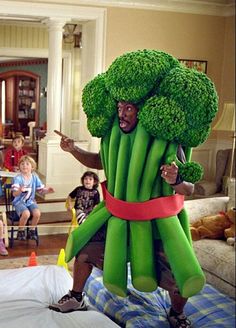 a man in a costume made to look like broccoli