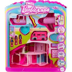 a pink barbie doll house with furniture and accessories