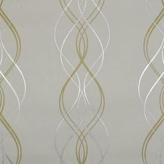 the wallpaper is white and gold with silver swirls