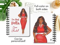 two spiral notebooks with an image of a woman wearing a red dress