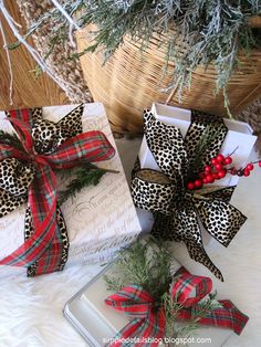 an image of christmas presents wrapped in plaid and bows