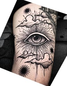 an all seeing eye tattoo on the arm