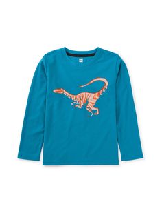 Designed especially for your dinosaur-loving kiddo who may be able to tell you that the Velociraptor actually had feathers, not scales, and was the size of a big chicken! Made from 100% soft cotton jersey, this long sleeve tee keeps its shape and color wash after wash. Above thigh length. Big Chicken, Biggest Chicken, European Aesthetic, Fall Styles, Kids Fashion Boy, Boy Tees, Tea Collection, Baby Boutique, Scales