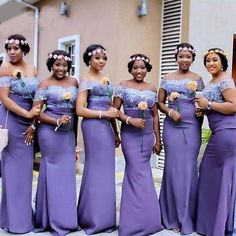 the bridesmaids are wearing purple dresses with flowers in their hair