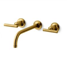 two gold colored faucets on a white background