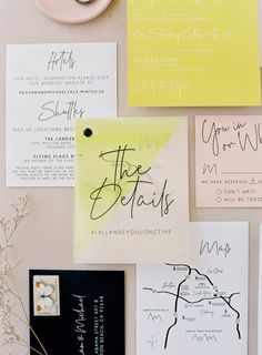 the wedding stationery is laid out on top of each other with different ink colors