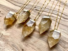 "Real crystal points in your choice of yellow Citrine or pink Rose Quartz dipped in gold electroplating! These stones measure approximately 20-25mm x 30-40mm. Chains are available in your choice of length: 18\" for a standard necklace length, 24\" for medium length, or 30\" for long length. You may also choose your chain finish: Real 14K Gold filled or Gold plated. I highly recommend the real 14K Gold filled chains as they are tarnish resistant & hypoallergenic! Finally, you may choose your Raw Citrine Necklace, Quartz Point Necklace, November Birthstone Jewelry, Raw Citrine, Crystal Point Necklace, Citrine Jewelry, Raw Rose Quartz, Citrine Necklace, Yellow Citrine