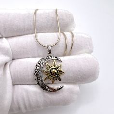 .925 Sterling Silver Two-Tone Sun And Necklace. Pendant Is On Your Choice Of A 16” Or 18” Sterling Silver Snake Chain. If A Longer Chain Is Needed Please Message For Availability And Pricing. Pendant: Height: 26.2mm, Width: 20.9mm, Thickness: 4.2mm, Bail Opening: 4.8mm, 925 Sterling Silver, Stamped, Rhodium Plated & Yellow Gold Plated Over Sterling Silver With A High Polish Finish Chain: Gauge 25, Width 1.1mmsterling Silver , Stamped Some Pictures Enlarged To Show Details Elegant Silver Necklace With Sun And Moon Design, Gold Sterling Silver Necklace With Sun And Moon Design, Silver Celestial Pendant Jewelry, Sterling Silver Sun And Moon Design Jewelry, Silver Pendant Charm Necklace With Sun And Moon Design, Silver Pendant Charm Necklaces With Sun And Moon Design, Silver Necklace With Sun And Moon Round Pendant, Silver Celestial Nickel-free Charm Necklaces, Celestial Silver Necklace Nickel Free