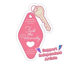 a pink key tag with the words, support independent arts