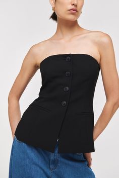 Embrace power dressing with the Ken bustier. Designed for a longline silhouette with functional, tonal buttons and silicone grip so that it doesn’t slip, it’s the kind of piece you can style several ways. Wear with a shirt or polo neck under, or pair with the matching KAI trousers and your favourite heels for an evening out. Strapless Shirt, Top Bustier, Womens Office, Power Dressing, Button Front Top, Street Style Trends, Chic Top, Conscious Fashion, Polo Neck