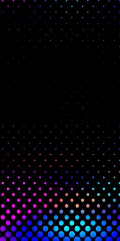 a black background with multicolored dots