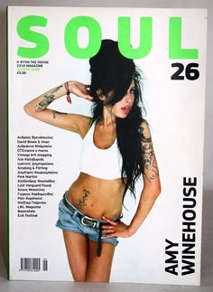 the front cover of soul magazine featuring a woman with tattoos and piercings on her stomach