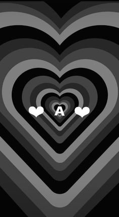 a heart with two hearts in the middle and an arrow at the center, on a black background