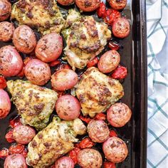 the chicken and vegetables are cooked in the pan on the stove top, ready to be eaten