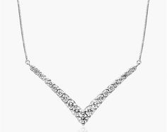 14K White Gold Lab-Created Diamond Graduated V Shape Bar Necklace. Top off any attire with this scintillating diamond necklace. Crafted in 14K gold, this elegant design features a V-shaped row of graduated-size diamonds. The bar is attached to a box chain and that secures with a spring-ring clasp. The necklace measures 18inches with an extra jump ring at 16 inches for versatility. Necklace Top, Grade 8, Lab Created Diamonds, Box Chain, Bar Necklace, The Bar, Jump Rings, Stone Bracelet, Spring Rings