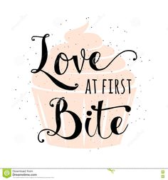 the phrase love at first bite with a cupcake