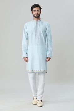 Sky jacket with mirror and thread embroidery. Comes with white churidar and a kurta. - Aza Fashions Festive White Nehru Jacket With Mirror Work, Blue Sherwani With Gota Work, Traditional White Nehru Jacket With Mirror Work, White Sherwani With Gota Work For Navratri, Navratri White Sherwani With Gota Work, White Chanderi Sherwani With Mirror Work, White Bollywood Sherwani With Embroidered Border, White Embroidered Bandhgala For Navratri, Mirror Jacket