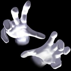 two white plastic hands are shown against a black background with light coming from the fingers