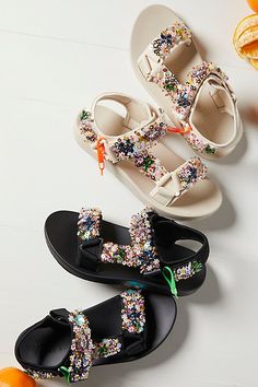 Make a statement in these sporty sandals featured in a so bold embellished style with crystal details, beading, floral appliques and sequins galore to sparkle and shine with every step you take. * Foam platform footbed * Adjustable straps | Sun Showers Sport Sandals by Nan-ku at Free People in Black, Size: EU 39 Sporty Sandals, Diy Sandals, Black Sandals Flat, Sporty Sandal, Fringe Sandals, Sandals Outfit, Beautiful Sandals, Trending Sandals, Beaded Sandals