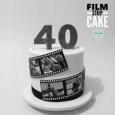 a film strip cake on a plate with the number forty written in black and white