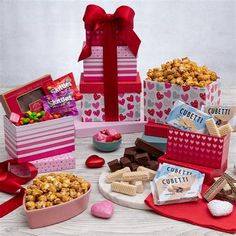 valentine's day treats and snacks arranged on a table