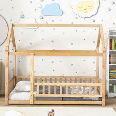 a child's bedroom with a bunk bed and bookshelf