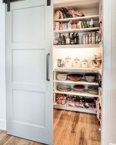 an open pantry with lots of food in it