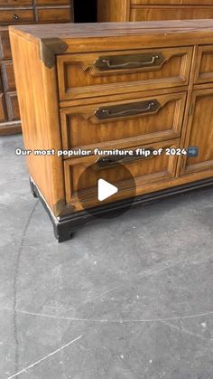 a large wooden dresser sitting on top of a floor