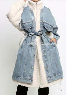 Faux fur, Shearling and denim patched coat w/waistbelt. Long, loose fit, zipper closure and drawstring neckline. *Runs big* Drawstring Neckline, Faux Fur, Zipper