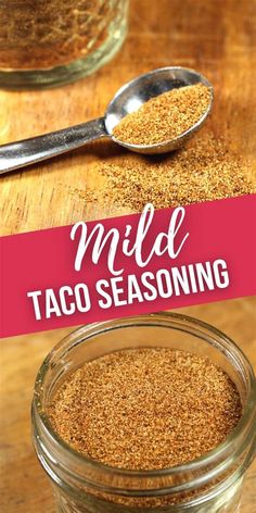 a glass jar filled with taco seasoning on top of a wooden table next to a spoon