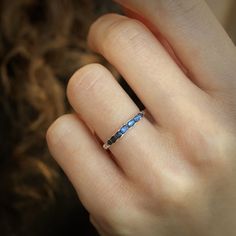 "Raw Uncut Rainbow Moonstone Band Ring // Silver Gold Raw Rough Uncut Organic Rustic Blue Flash Unique Rainbow Moonstone Wedding Band Ring This listing is for one raw natural Rainbow Moonstone band stone ring. Pictured ring is in sterling silver with dark base. DETAILS:  Stone: natural raw Rainbow Moonstone, dark metal base Metal:  - 925 silver  - 925 oxidise black (will start wearing lighter/off immediately) - 14k yellow, rose and white gold - 18k yellow gold Band width: approx. 2x1mm, hammered Stone part size: approx.2mm high and around 2.7-3mm wide Note: waterproof, stackable, can't be resized but contact if needed. SHIPPING: - express shipping with expected delivery in 2-8 business days world wide, contact phone number required. HURRY?: Now you can purchase \"rush order\" service to sh Moonstone Wedding Band, Ring Moonstone, Dark Metal, Rustic Blue, Electroformed Jewelry, Rainbow Moonstone Ring, Wedding Band Ring, Natural Rainbow, Moonstone Ring