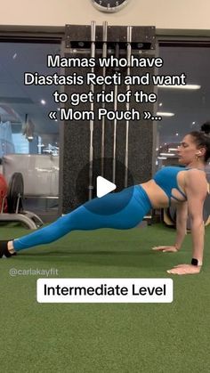 a woman is doing push ups on her stomach