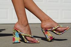 These adorable statement heels are sure to make any outfit pop. Featuring a print upper with lace up detail and cushioned foot bed. Approximately a 5 inch heel. Casual Fitted Platform Heels, Trendy 4-inch Heels For Spring, Trendy Lace-up Heels For Summer, Casual High Heels With Wrapped Heel, Multicolor Casual Heels For Spring, Trendy Synthetic Lace-up Heels, Multicolor Casual Heels With Open Heel, Casual Block Heels With Floral Print, Casual Wedge Heels With Floral Print