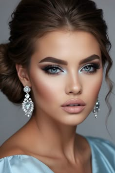 Get inspired with these 10 stunning light blue prom makeup ideas that will make your eyes pop and help you create a glamorous look for your special night. Wedding Makeup With Blue Eyeshadow, Makeup With A Silver Dress, Makeup Looks Light Blue Dress, Blue Eyes Prom Makeup, Cinderella Eyeshadow Looks, Prom Makeup Looks Blue Dress, Makeup With Hint Of Blue, Makeup Ideas With Blue Eyeshadow, Pretty Prom Makeup For Blue Eyes