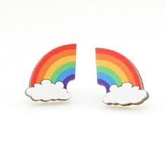 pair of rainbow and cloud earrings on white background