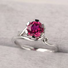 ◆ The ring is handcrafted from sterling silver and decorated with a dazzling 7*7 mm ruby. It is suitable for engagement/anniversary/daily occasion. ◆ Production Description: Main stone Type: Lab Ruby Main Stone Shape: Round Cut Main Stone Size: 7*7 mm(1.66ct) Side stone: None Metal: 925 Sterling silver - Other options available in the drop down menu ◆ Customization: √Free for Add Engraving √Other Metal Type Available √Other Gemstones & Shapes Available √Personalization Requests Available ◆ Packa July Birthstone Ring, July Birthstone, Engagement Anniversary, Ruby Ring, Beautiful Gift Boxes, Ring Sterling Silver, Birthstone Ring, Sterling Ring, Statement Ring