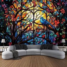 a living room with a large mural on the wall