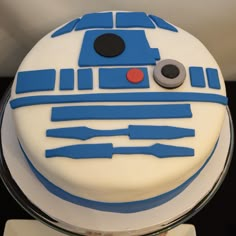 a star wars cake with blue and white frosting