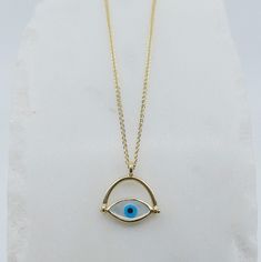 Eye Roll Necklace is a fun take on the evil eye. The setting is made out of 14k gold and flips around which is why I've named it an eye roll. This pendant is on an 18 inch chain perfect to stack with your other necklaces. Details: Eye (Mother of Pearl, Turquoise, and Onyx) measures 4.5 x 10.5mm Pendant measures 14.7 x 15mm18 inch 14k chain Available in 14k Gold (yellow, rose, or white gold)**please write in notes upon checkout with desired gold color** Free Shipping on Domestic Orders Materials: 14k Yellow Gold Evil Eye Necklace, Symbolic Evil Eye Yellow Gold Necklace, Symbolic Yellow Gold Evil Eye Necklace, 14k Gold Evil Eye Necklace, 14k Yellow Gold Evil Eye Charm Necklace, 14k Gold Evil Eye Round Necklace, Yellow Gold Evil Eye Charm Necklace, Yellow Gold Evil Eye Round Pendant Necklace, 14k Gold Evil Eye Amulet Necklace