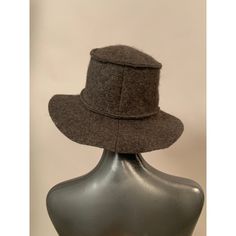 This three season Chanel wool hat is in excellent condition, marked a size 57, and it is so soft it can be folded to pack flat in your suitcase for travel. The color is a mix of brown and grey  and it has a channel quilted brim. The interior circumference of the hat is 21". Brown Wool Felt Hat For Travel, Brown Fur Felt Hat For Travel, Brown Felt Hat For Winter Travel, Classic Brown Wool Cloche Hat, Brown Wool Cloche Hat With Short Brim, Brown Wool Cloche Hat For Winter, Brown Wool Cloche Hat With Curved Brim, Wool Travel Hat With Short Brim, Wool Hat With Short Brim For Travel